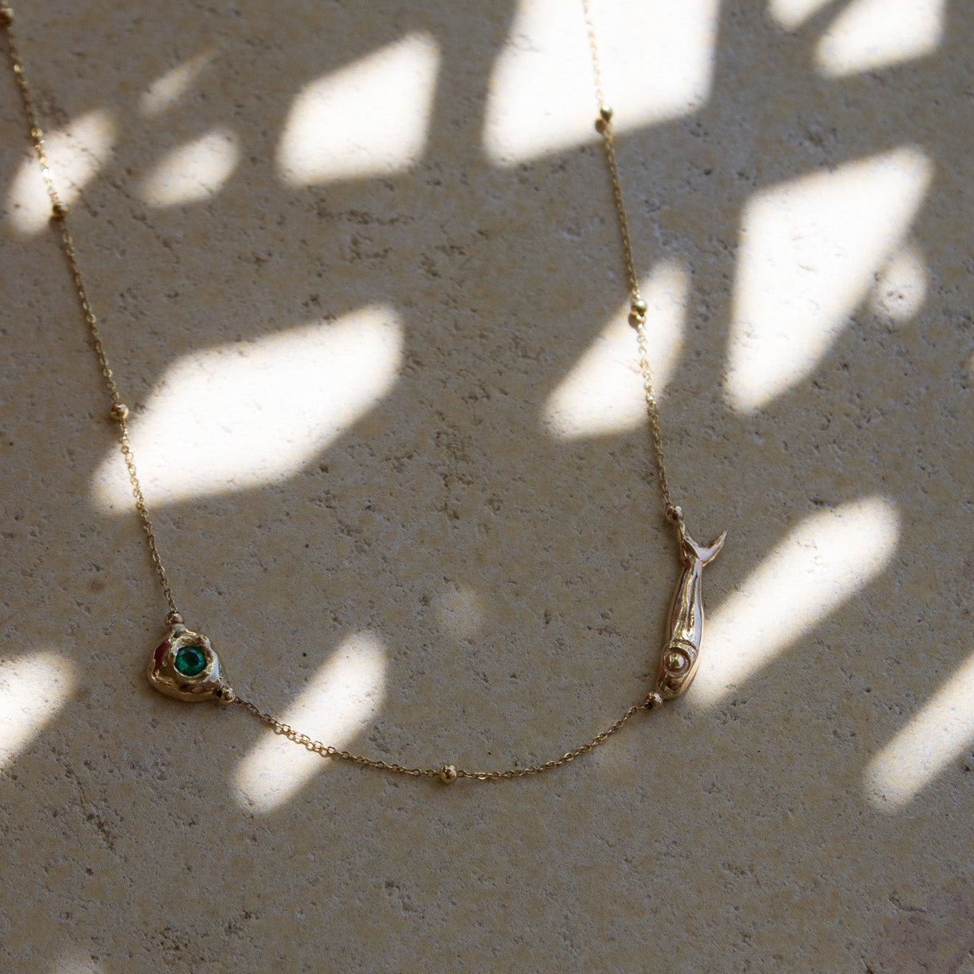 KM Emerald Fish Necklace